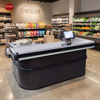 Comptoir de caisse commercial noir en forme de L avec plateau en acier inoxydable pour l'achat d'approvisionnement en chaîne d'approvisionnement d'entreprise