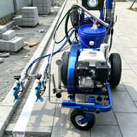 Machine de marquage routier par pulvérisation à froid avec guidage laser précis pour les lignes de terrains sportifs