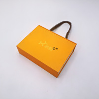 Boîte d'expédition personnalisée en carton ondulé avec insert en carton, logo E B Flute, et poignée en corde