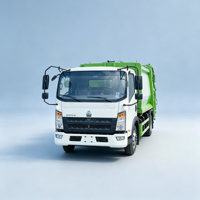Truk Sampah Compactor HOWO 4x2, Truk Sampah Compactor HOWO 7 Meter Kubik, Truk Sampah Compactor HOWO