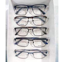 Modelos mixtos Gafas de metal Monturas de metal Ópticas Clásicas Unisex Nuevo diseño Gafas populares Monturas de metal