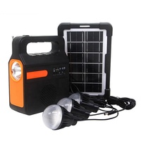 Nouvelle Banque d'alimentation solaire multifonctionnelle avec radio FM et port de charge USB, ainsi que un ensemble d'ampoules