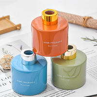Bouteille diffuseur de parfum d'ambiance vide en verre de 140 ml, cylindrique, colorée, pour aromathérapie, avec surface décorée de luxe