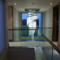 Lustre moderne pour escalier, grand luminaire de luxe en cristal pour plafond haut, lustre en chaîne de cristal en spirale effet goutte de pluie