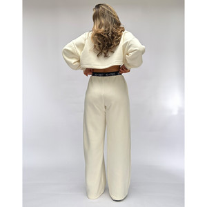 เสื้อสเวตเตอร์สีครีมเสื้อจั๊มเปอร์ใส่อยู่บ้านโลโก้ทรงถั่ว - Product Image 1