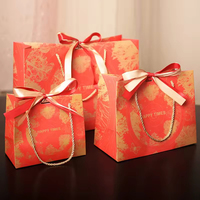 Sacs cadeaux en papier avec logo personnalisé et poignée en ruban pour l'emballage de vente au détail, sacs de luxe pour boutiques, vente en gros