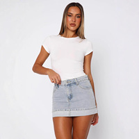 Mini-jupe évasée en jean délavé pour femme, coupe moulante, séchage rapide, style printemps