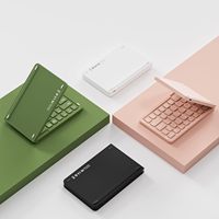 Pabrik Tiongkok logo Oem bluetooth isi ulang ukuran saku Teclado dapat dilipat Espanol Keyboard perjalanan untuk iphone