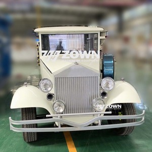 Limousine électrique blanche de style vintage avec roues chromées et intérieur élégant - Product Image 3