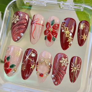 Uñas Postizas de Lujo Premium ABS, 24 Piezas, Medianas, Almendradas, con Diseño de Flores y Copos de Nieve Navideños, Más Vendidas - Product Image 1