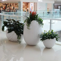 Maceta de Fibra de Vidrio Yuwei Yuwei-F en Forma de Huevo, Acabado Tallado a Mano, Diseño Moderno y Ecológico, Duradera, para Interiores/Exteriores