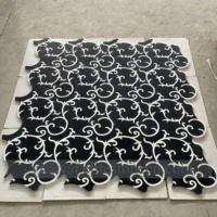 Tuile de motif de pierre de mosaïque de mur de conception de jet d'eau noir de forme de coquille
