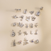 Pendentif en acier inoxydable pour la fabrication de bijoux DIY, gravé avec un chien, une étoile de mer, une étoile géométrique, breloques en acier inoxydable en gros