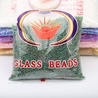 Vente directe d'usine bonne qualité 2mm rond Rocailles bugle 2 perles de rocaille en verre taillé Mini perles de rocaille pour la fabrication de bijoux
