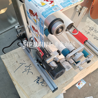 Étiqueteuse de bouteilles rondes de vin adhésive semi-automatique à grande vitesse étiqueteuse sans bulles étiqueteuse de bouteilles plates