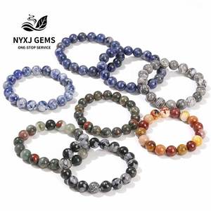กำไลข้อมือหินโซดาไลท์ธรรมชาติสีน้ำเงินลายจุด ขนาด 6/8/10 มม. สำหรับทุกเพศ ขายส่ง - Product Image 1