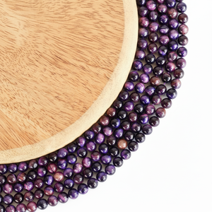Exportateur indien de perles rondes chauffées en œil de tigre violet de qualité supérieure AAA de 8 mm pour la fabrication de bijoux et la lithothérapie - Product Image 1