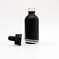 Flacon compte-gouttes à vis en verre d'huile essentielle de couleur personnalisée 30ml 60ml 120ml Flacon compte-gouttes en verre noir mat pour sérum cosmétique