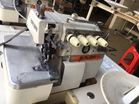 Machine à coudre surjeteuse à grande vitesse à quatre fils Siruba 747 d'occasion