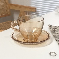Tasse en verre transparent épaissi de haute qualité tasse en verre de lait résistant à la chaleur conception de perles tasse à café domestique avec poignée