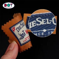 Usine d'étiquettes Nouveau design Tissu tissé personnalisé avec logo Jeans Patchs en cuir véritable pour veste et canapé