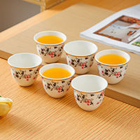 Nouvelle tasse à thé en céramique dorée de style chinois minimaliste à motifs floraux pour cérémonie du thé, origine inconnue