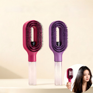 Brosse à cheveux multifonctionnelle 2-en-1 avec pulvérisation d'huile essentielle liquide, atomisation à un clic pour des cheveux volumineux et soignés, idéale pour le dessus de la tête - Product Image 1