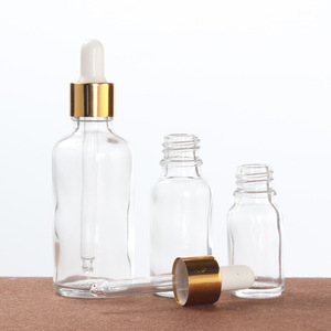 Luxus Design 50ml Flasche mit ätherischen Ölen aus klarem Glas mit goldenem Deckel und matten Plastik kappen für Hautpflege serum 5-100ml Tropf flasche - Product Image 3