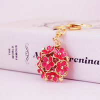 Collection de Luxe Exquise, Best-seller, Pendentif de Sac et Porte-clés en Métal en Forme de Fleur à Cinq Pétales Mignonne, Idéal pour les Femmes à la Mode