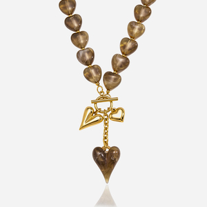 <span class=keywords><strong>Collana</strong></span> J&D Jewelry in acciaio inossidabile placcato oro 18 carati con perline acriliche trasparenti a forma di <span class=keywords><strong>cuore</strong></span> e chiusura a T, gioielli per le vacanze estive - Product Image 1