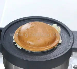 वाणिज्यिक यूएफओ हैमबर्गर मशीन गर्म बिक्री रेस्तरां रसोई उपकरण लोकप्रिय इलेक्ट्रिक यूएफओ बर्गर निर्माता मशीन