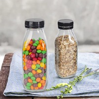 Bouteille en verre carrée de 500 ml/1000 ml avec bouchon à vis pour l'emballage du vin, des spiritueux neutres et de la tequila, sérigraphiée et estampillée à l'or