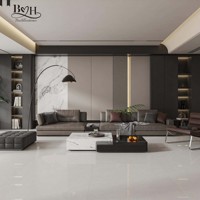 Carrelage grand format en porcelaine marbrée gris clair, pleine masse, haute brillance, antidérapant, pour sols de villas, salons et chambres.
