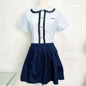 Originale attraente ragazza e ragazzo australiano arabo tailandese estate scuola materna set uniforme della scuola primaria