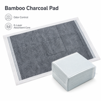 Tapis d'apprentissage jetables en charbon de bambou à haute absorption pour chiots, élimination des odeurs, vente en gros pour distributeurs d'articles pour animaux de compagnie