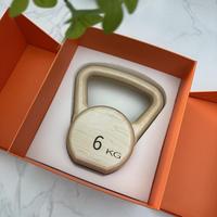 Kettlebell de luxe haut de gamme en acier massif entièrement recouvert de bois, poids de fitness personnalisé avec logo pour la salle de sport à domicile