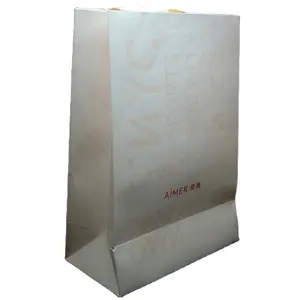 Özel Logo baskı Premium kozmetik parfüm takı ambalaj çanta kolları ile lüks hediye Kraft alışveriş kağıt torbalar