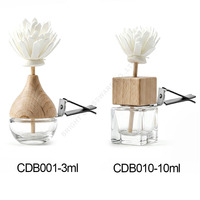 Vente en gros de diffuseurs de parfum pour voiture en verre transparent personnalisés de 8 ml, mini flacons suspendus pour aromathérapie avec emballage, thème Noël