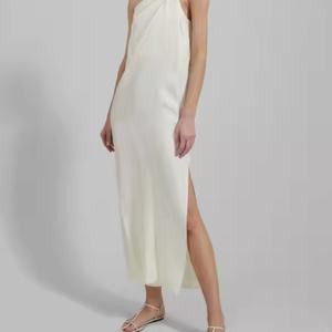 ชุดเดรสผ้าฝ้ายสีพื้นดีไซน์ใหม่จากโรงงานผู้ผลิต (OEM) สำหรับฤดูร้อน ชุดเดรสผู้หญิงแบบผูกคอเว้าหลังสีขาวสำหรับใส่ไปชายหาด - Product Image 1