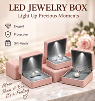 Boîte à bijoux moderne de luxe en similicuir pour boucles d'oreilles, bracelets, colliers et bagues, avec éclairage intégré, vente en gros