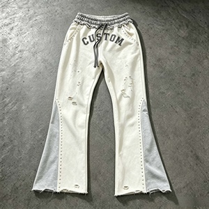Pantalon évasé personnalisé pour homme, décontracté, effet usé, taille élastique avec cordon de serrage, en coton patchwork, style jogging - Product Image 1