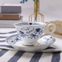Tasse en porcelaine fine avec soucoupe, service à café et thé 200 ml, poignée dorée, style nordique, écologique, compatible lave-vaisselle, pour le thé de l'après-midi et les cafés