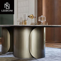 Table et chaise de salle à manger de luxe en acier inoxydable brossé et dessus en marbre artificiel 8 places