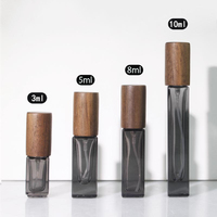 Vente en gros de 3ml 5ml 8ml 10ml mini bouteilles d'emballage vides de forme carrée de voyage bouchon en bois pour huiles essentielles et parfums
