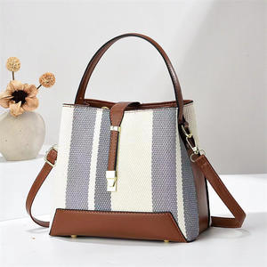 Bolso de Mano de Lona de Diseño de Lujo con Forro de Cuero Genuino, Cierre de Cremallera y Correa Cruzada Unisex - Product Image 2