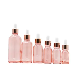 Luxo 1oz rosa redondo óleo essencial garrafa vazia 30ml 50ml rosa frasco conta-gotas de vidro ouro para cosméticos