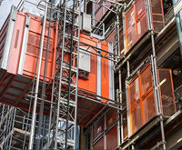 Liste de prix haute capacité Construction palan Site levage ascenseur Machine élévateurs pour matériaux de construction
