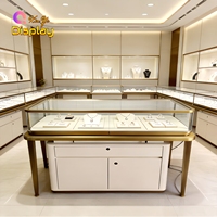 Comptoir de présentation de bijoux en or directement de l'usine avec éclairage LED et service de logo personnalisé pour les magasins de détail et salles d'exposition