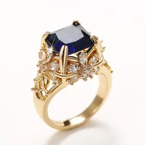 CAOSHI OEM lujo cuadrado azul Cubic Zirconia chapado en oro flor diseño imitación diamante anillos para mujer boda joyería CZ anillos