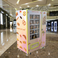 Garantie d'un an Distributeur automatique de cartes à collectionner Machine à gâteau avec ascenseur Distributeur de pièces Paiement Jeton de carte de crédit pris en charge